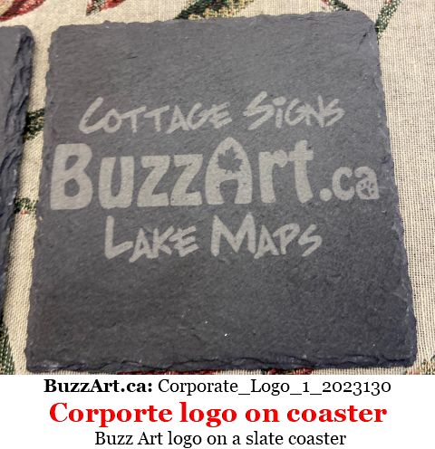 Buzz Art logo on a slate coaster